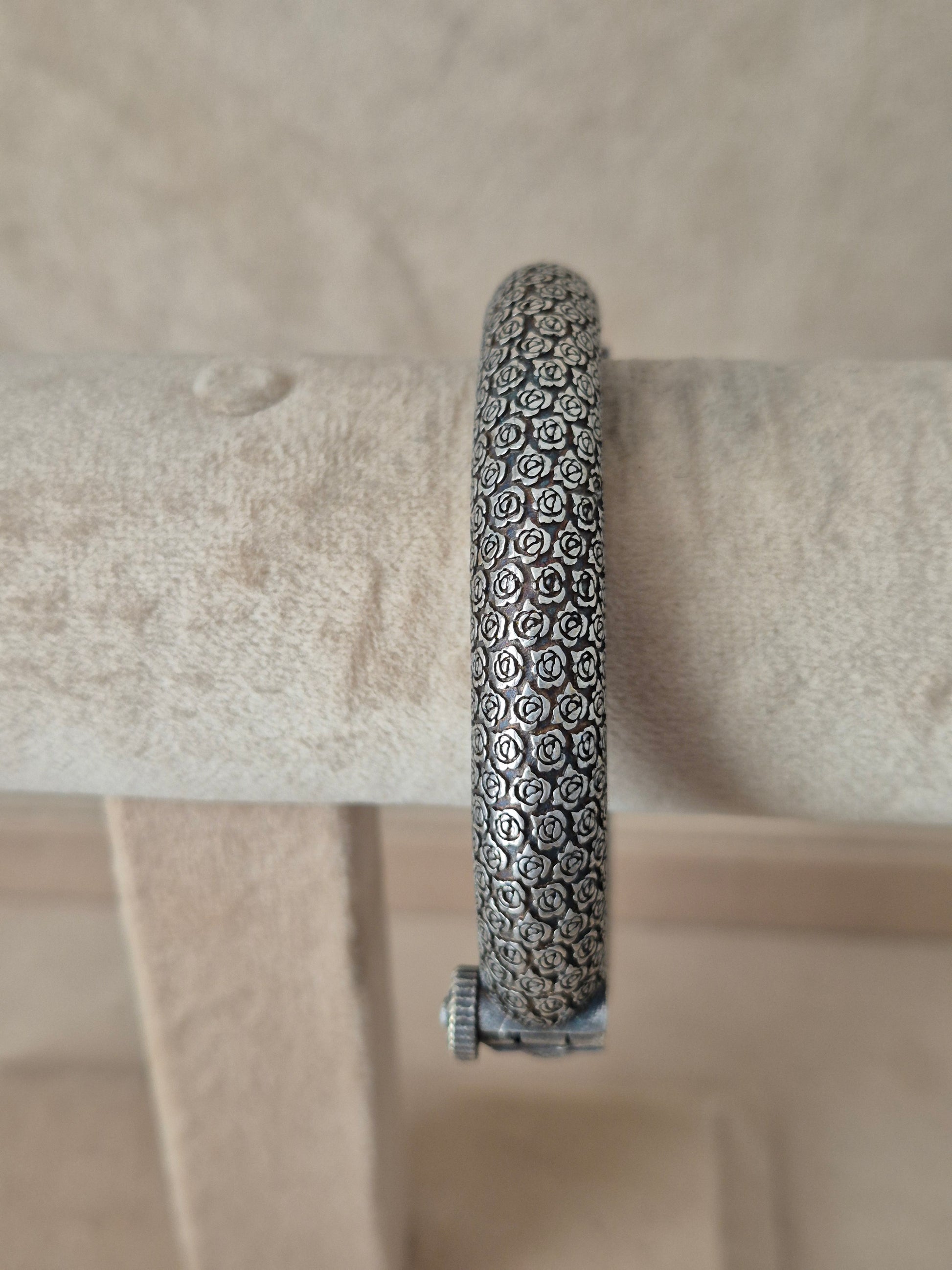 Intricately designed silver oxidized bangle bracelet by naitri.in