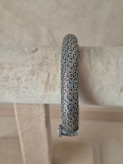 Intricately designed silver oxidized bangle bracelet by naitri.in