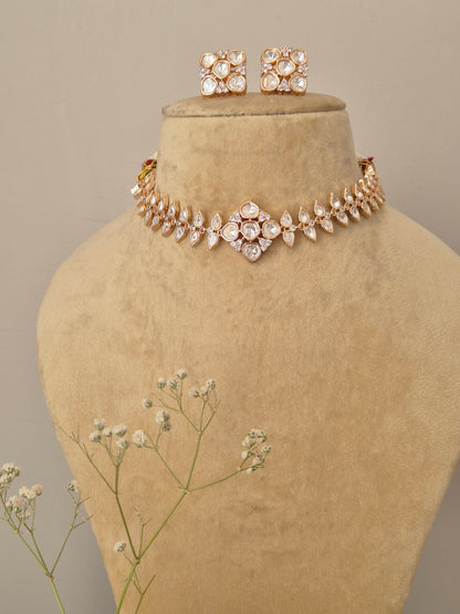 Close-up of the Hazel American Diamond necklace, featuring a rose gold finish and a central floral-inspired diamond cluster by naitri.in