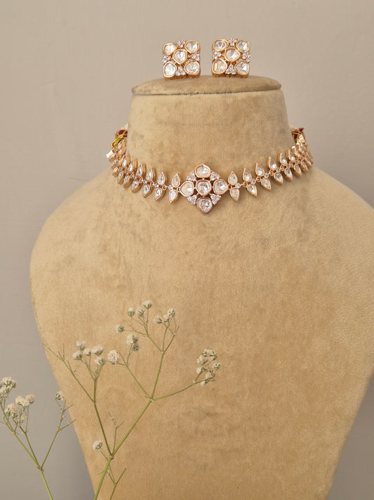 Close-up of the Hazel American Diamond necklace, featuring a rose gold finish and a central floral-inspired diamond cluster by naitri.in