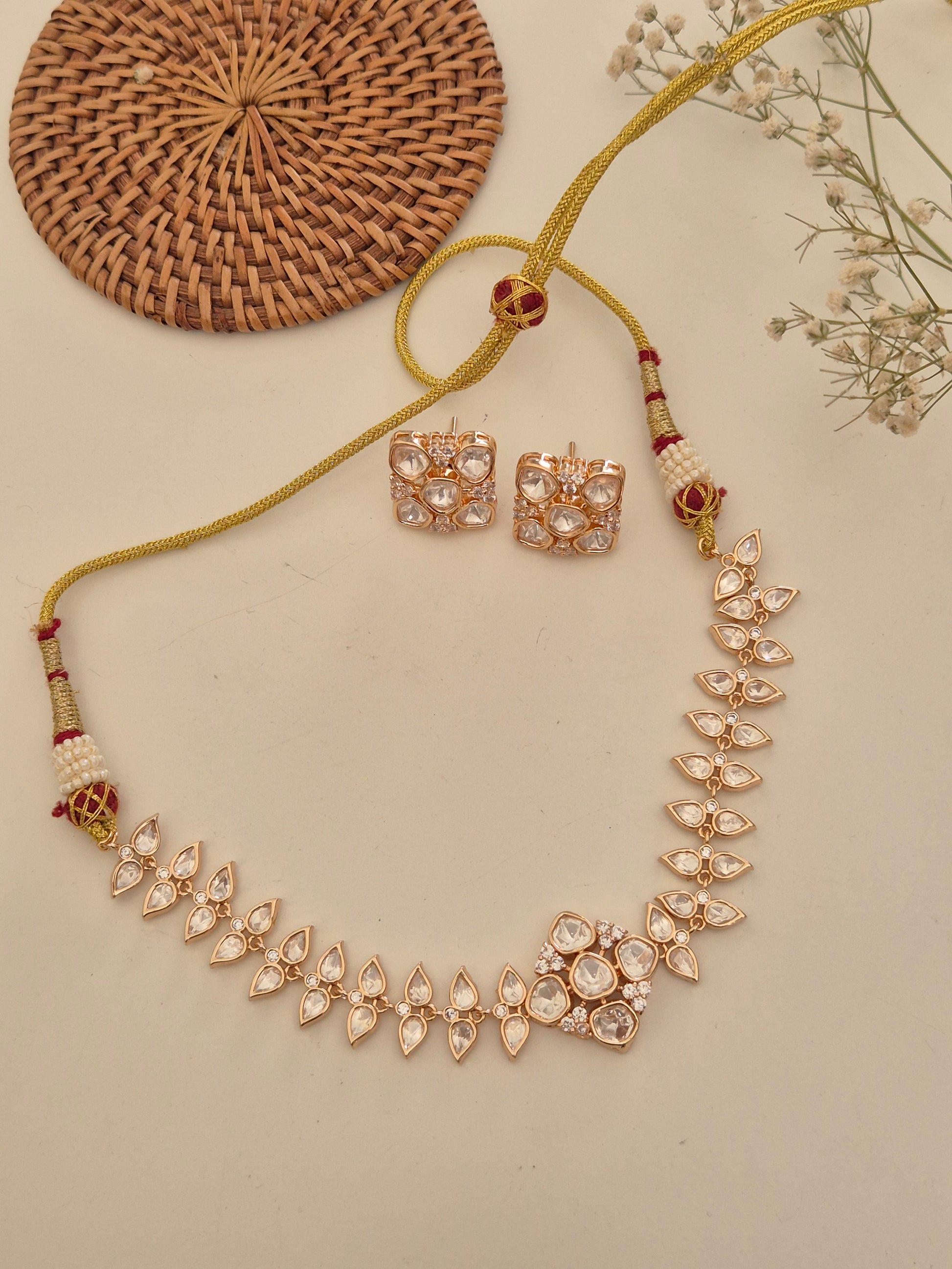 Handcrafted American Diamond necklace set for weddings, featuring a geometric choker design and high-shine alloy metal by naitri.in