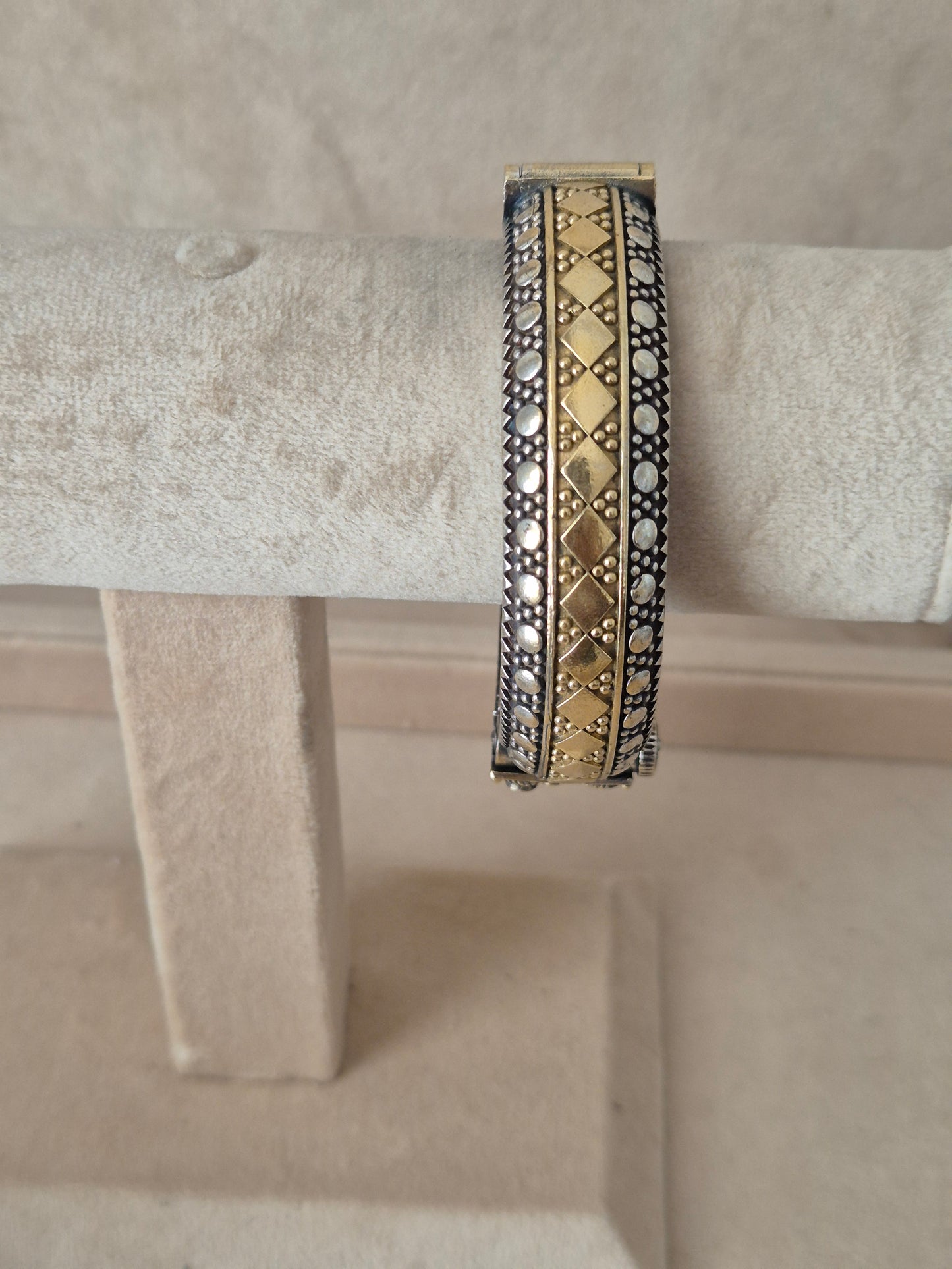 Detailed antique oxidized dual-tone bangle with geometric patterns. by naitri.in