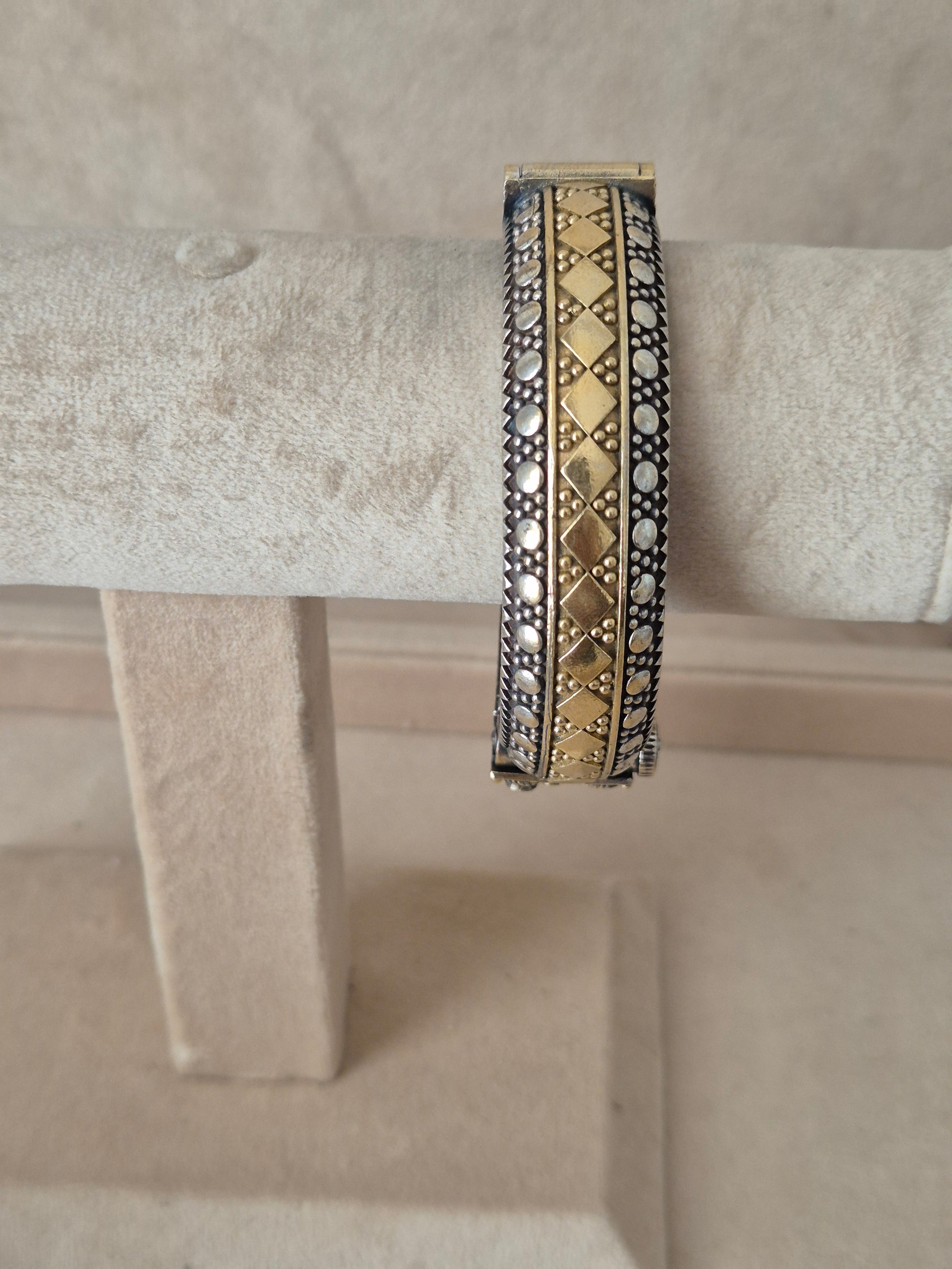Detailed antique oxidized dual-tone bangle with geometric patterns. by naitri.in
