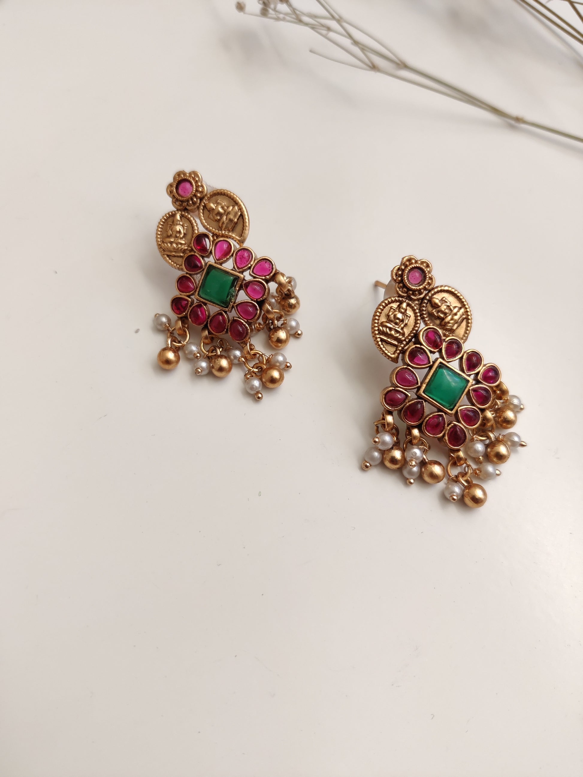 Majestic gold-tone temple necklace set in metal alloy featured to highlight intricate design and shine