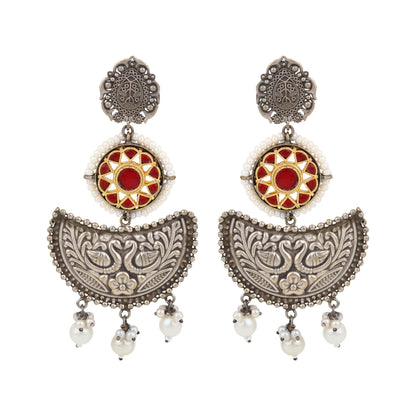 Silver-tone stud earrings, intricate oxidized design, shown on white background