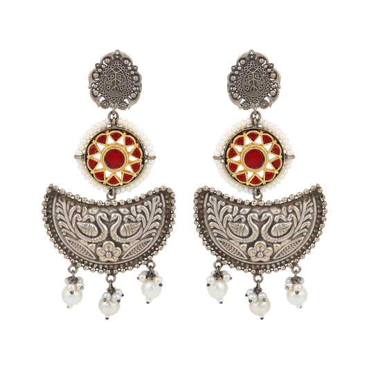 Silver-tone stud earrings, intricate oxidized design, shown on white background