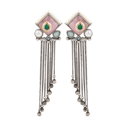 Red and pink stud earrings, Kajal by Naitri, stone design on white.