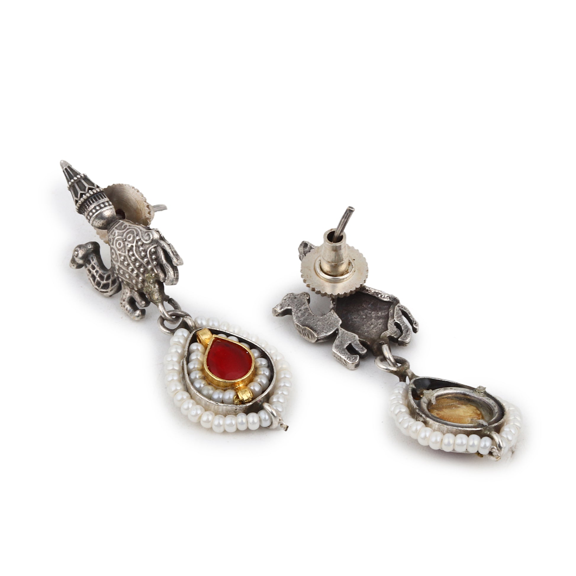 Dual-tone red and silver hasli necklace, Meesha Hasli Set by Naitri on bust form.