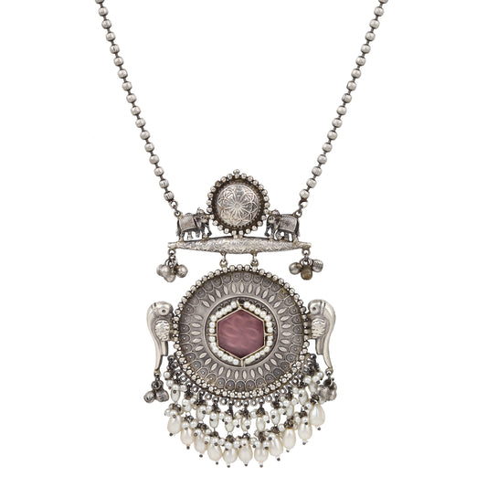 Silver, white, and pink pendant necklace set, Chandana by Naitri, displayed flat.