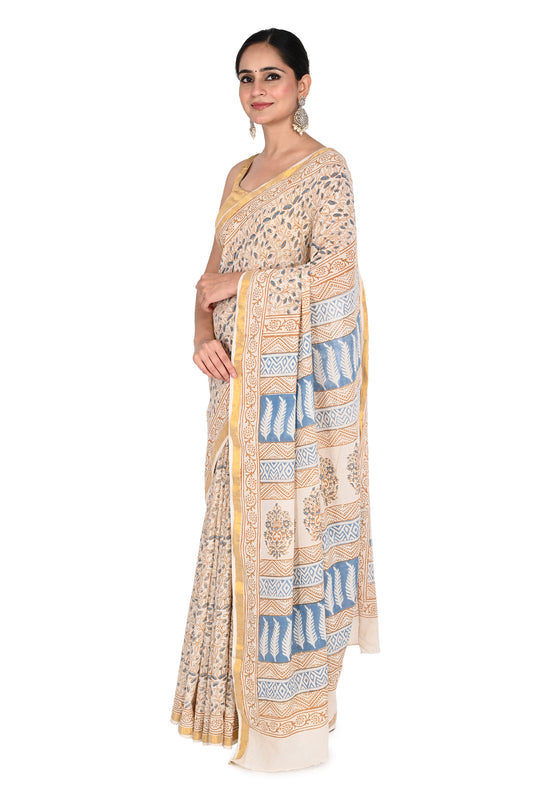 Indrakshi Hand Block Printed Cotton Saree featuring traditional Bagh print designs in blue and beige on a white base by naitri.in