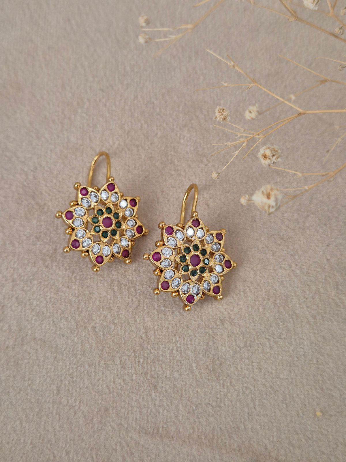 Indumati handcrafted gold-finish floral earrings with multi-colored stone accents by naitri.in