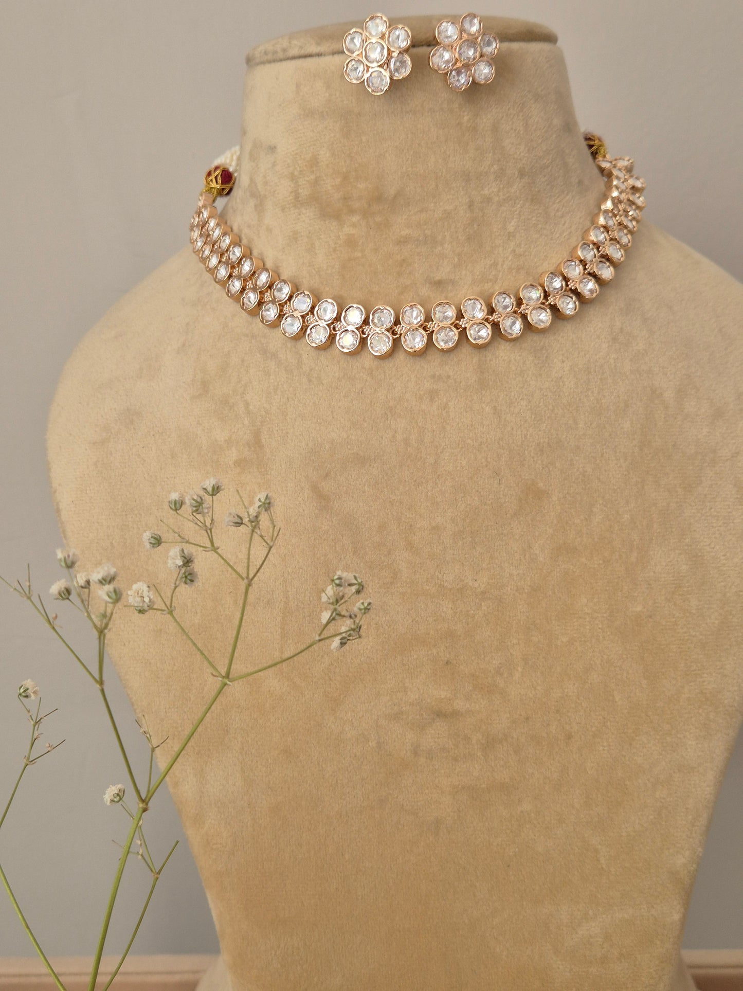American Diamond Necklace Set in rose gold finish with floral crystal earrings by Naitri.in