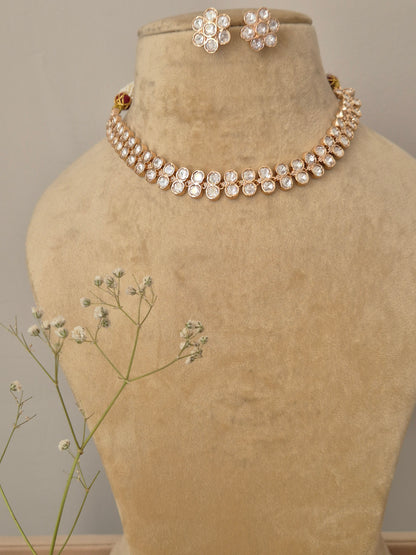 American Diamond Necklace Set in rose gold finish with floral crystal earrings by Naitri.in