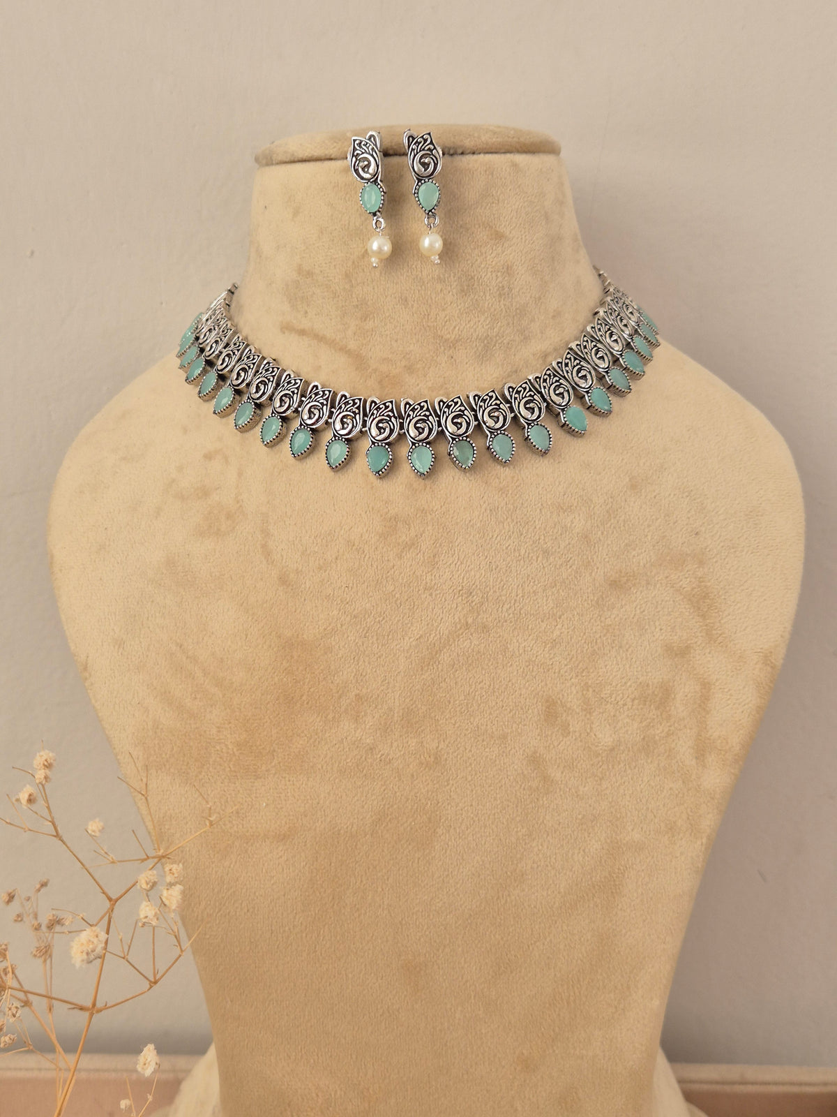 Necklace Set – handcrafted oxidized silver-plated necklace with turquoise stones and matching earrings by Naitri.in