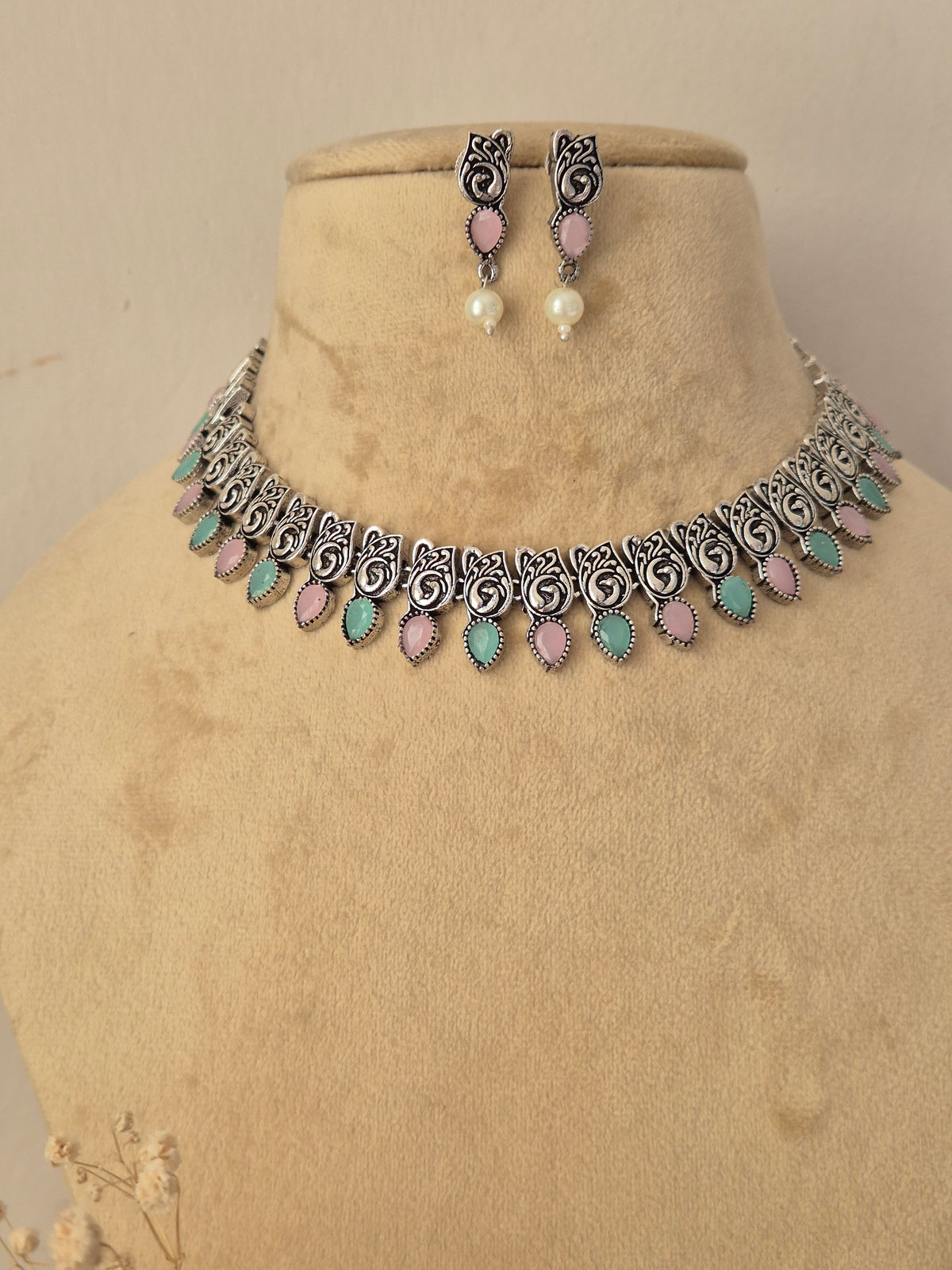 Handcrafted oxidized silver choker necklace set with turquoise-blue stones and hanging pearl earrings by naitri.in