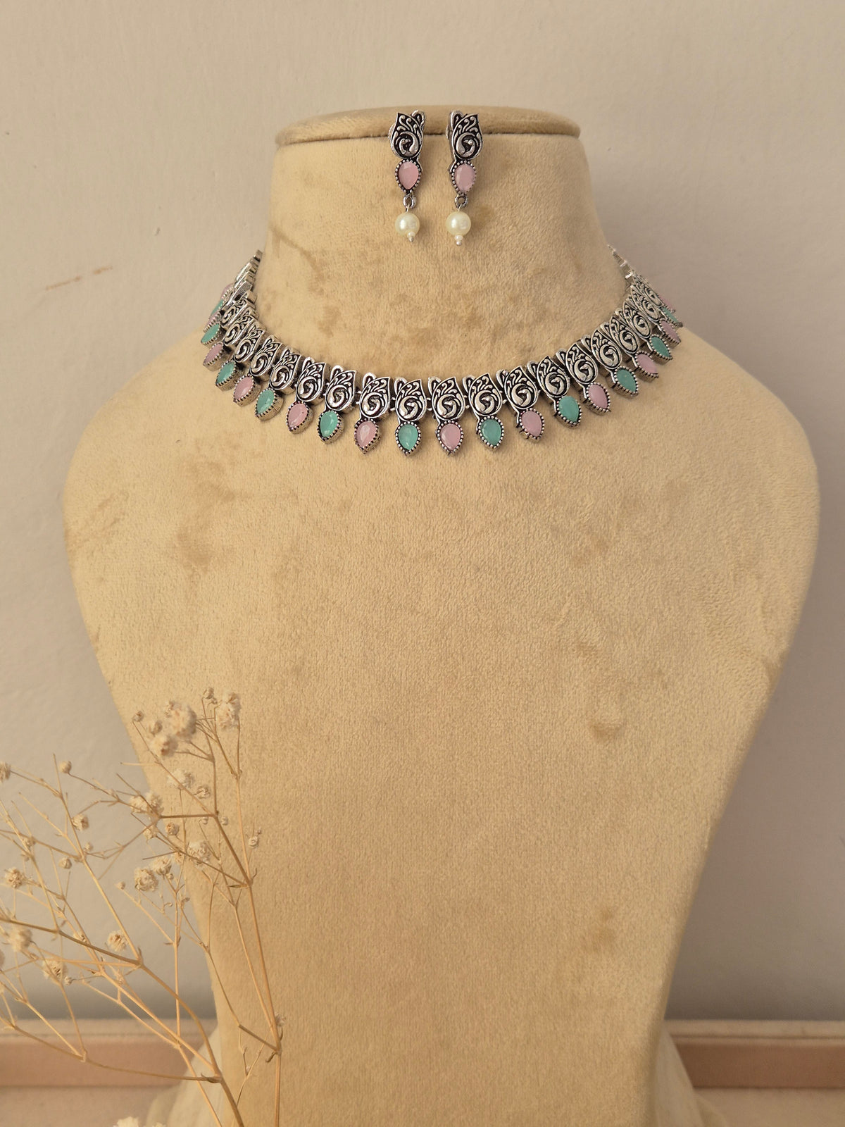 Kashmira silver oxidized choker necklace with light blue stone accents and matching pearl drop earrings by naitri