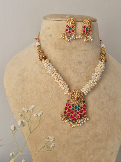 Artisanal Kaveri pearl necklace and earring set in a modern Indian aesthetic, by naitri.in