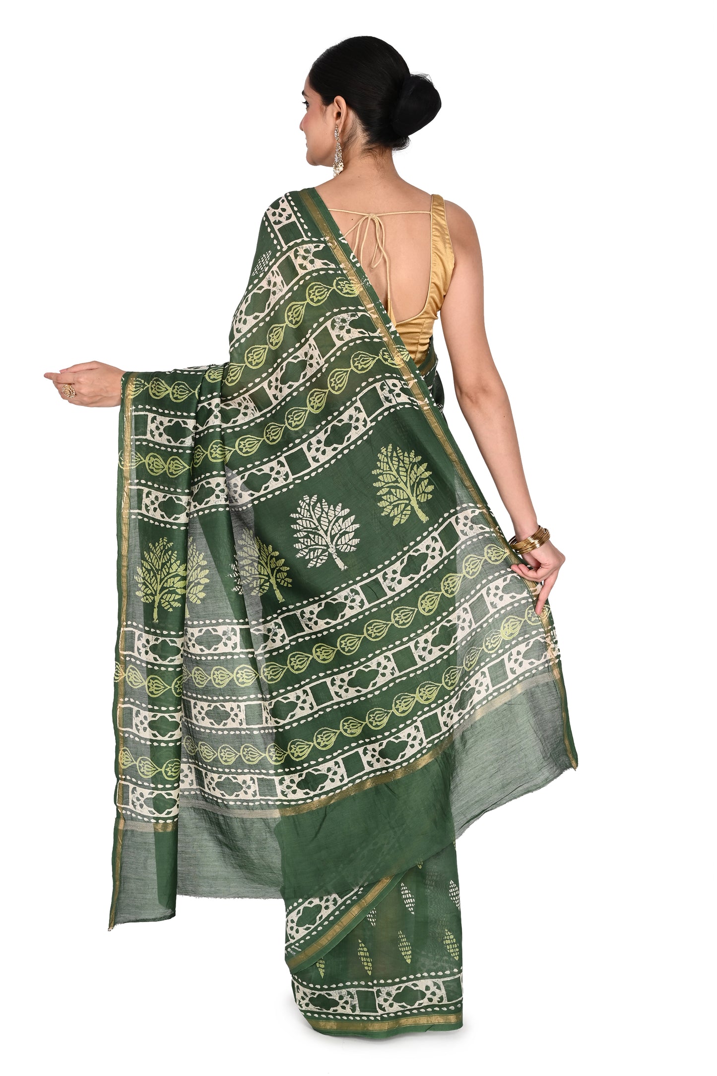 dark green hand-block printed saree in a fluid cotton-silk blend, showcasing authentic heritage craft and elegant artisanal patterns by naitri.in