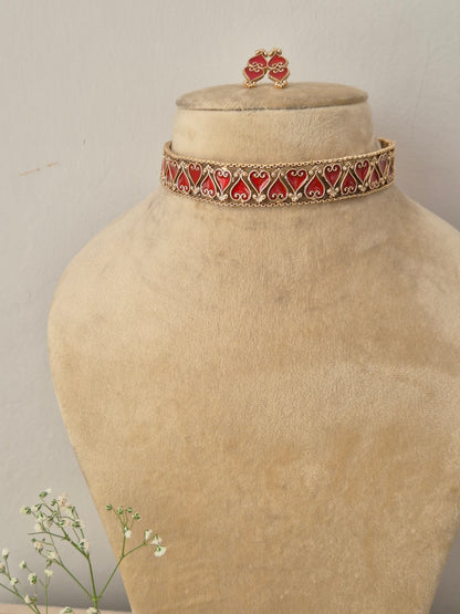 Elegant red and gold-toned traditional choker jewelry set, Naitri gold-plated Latika choker and earring set with red enamel detailing by naitri.in