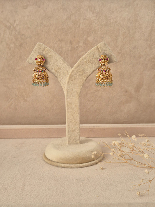 Manjari handcrafted gold-finish jhumka earrings with ruby and emerald-stone embellishmentsby naitri.in