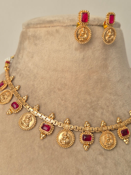 Gold jewelry set with red stones goddess motifs crafted antique craftmanship by naitri.in