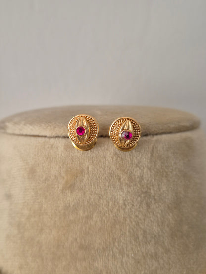 Antique gold-plated ethnic delicate dangling circular medallions with ruby-pink stone accents by naitri.in