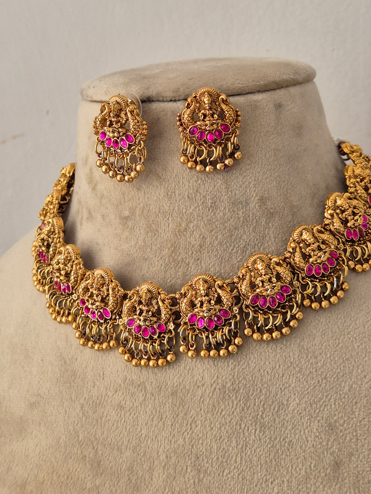Gold-plated traditional Meher necklace and earring set by Naitri.in