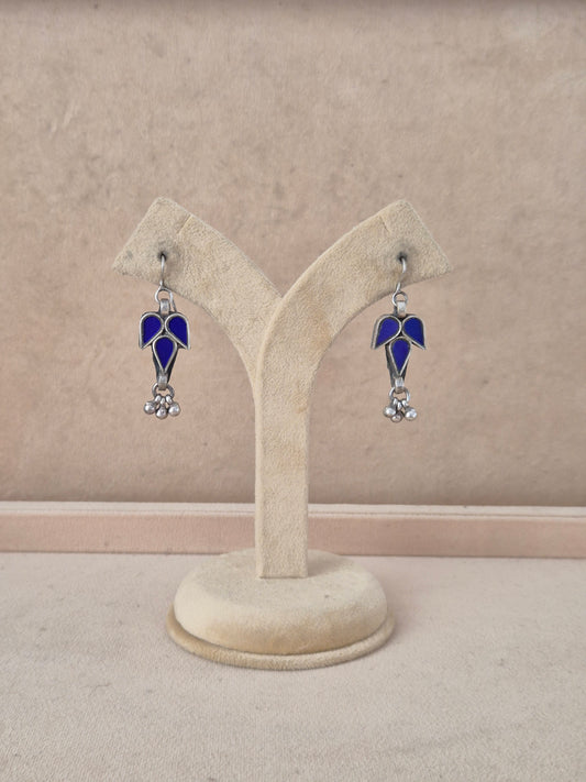Glass Earrings featuring handcrafted blue glass in a leaf design with small silver beads by naitri.in