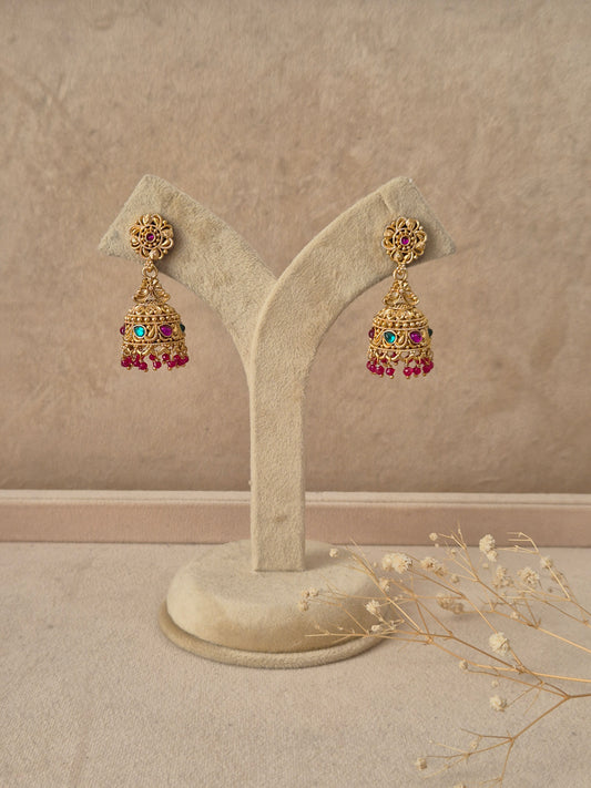 Milli handcrafted rose gold dangle earrings with colorful stone embellishments by naitri.in