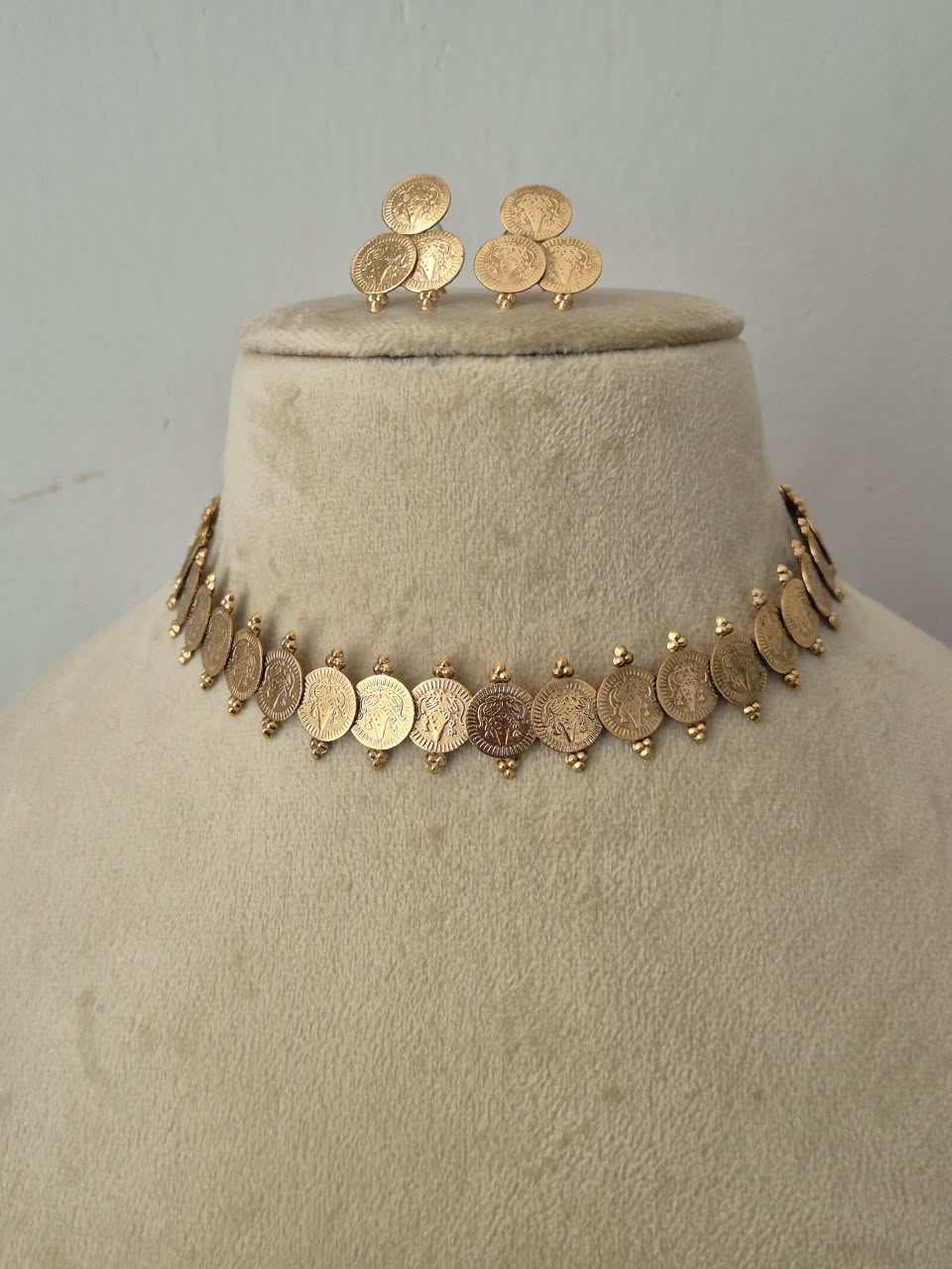 Antique finish gold coin earrings and choker set for ethnic wear, by naitri.in