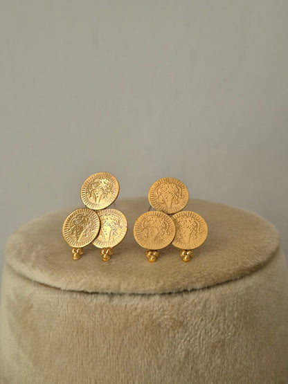 A pair of gold coin stud earrings  Pair of classic Indian ethnic gold coin earrings featuring delicate coin charms suspended from circular studs by naitri.in