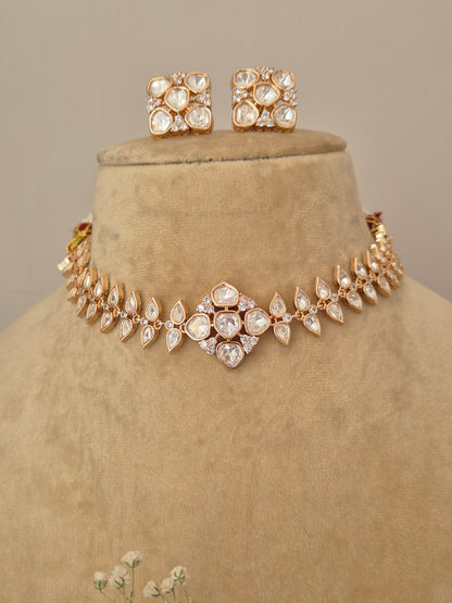 Modern Indian festive jewelry: Hazel American Diamond necklace set in rose gold, perfect for pairing with sarees and lehengas by naitri.in