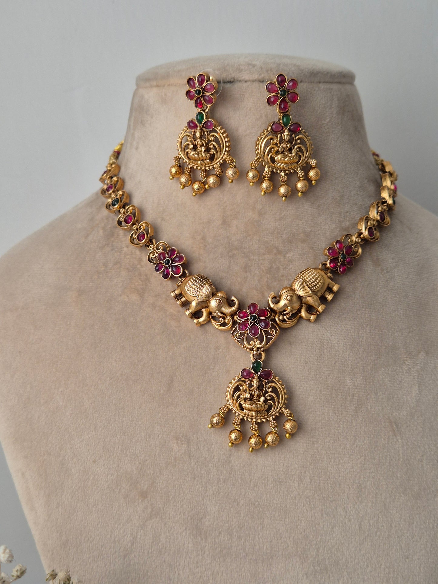 Studded with radiant ruby and green kemp stones, finished with delicate golden beads for weddings, festivals, and ethnic