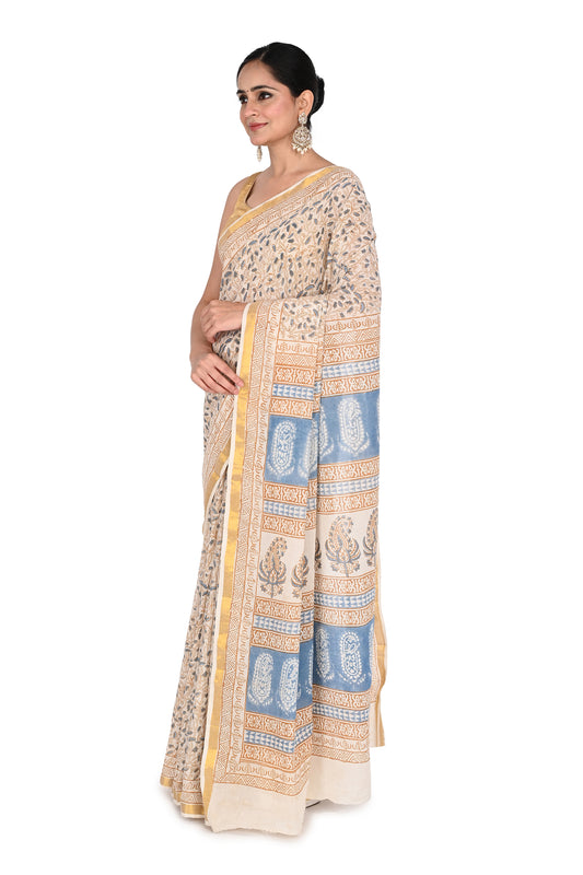 Ambika Hand Block Printed Cotton Saree featuring traditional Bagh prints in blue and beige on breathable cotton fabric by naitri.in