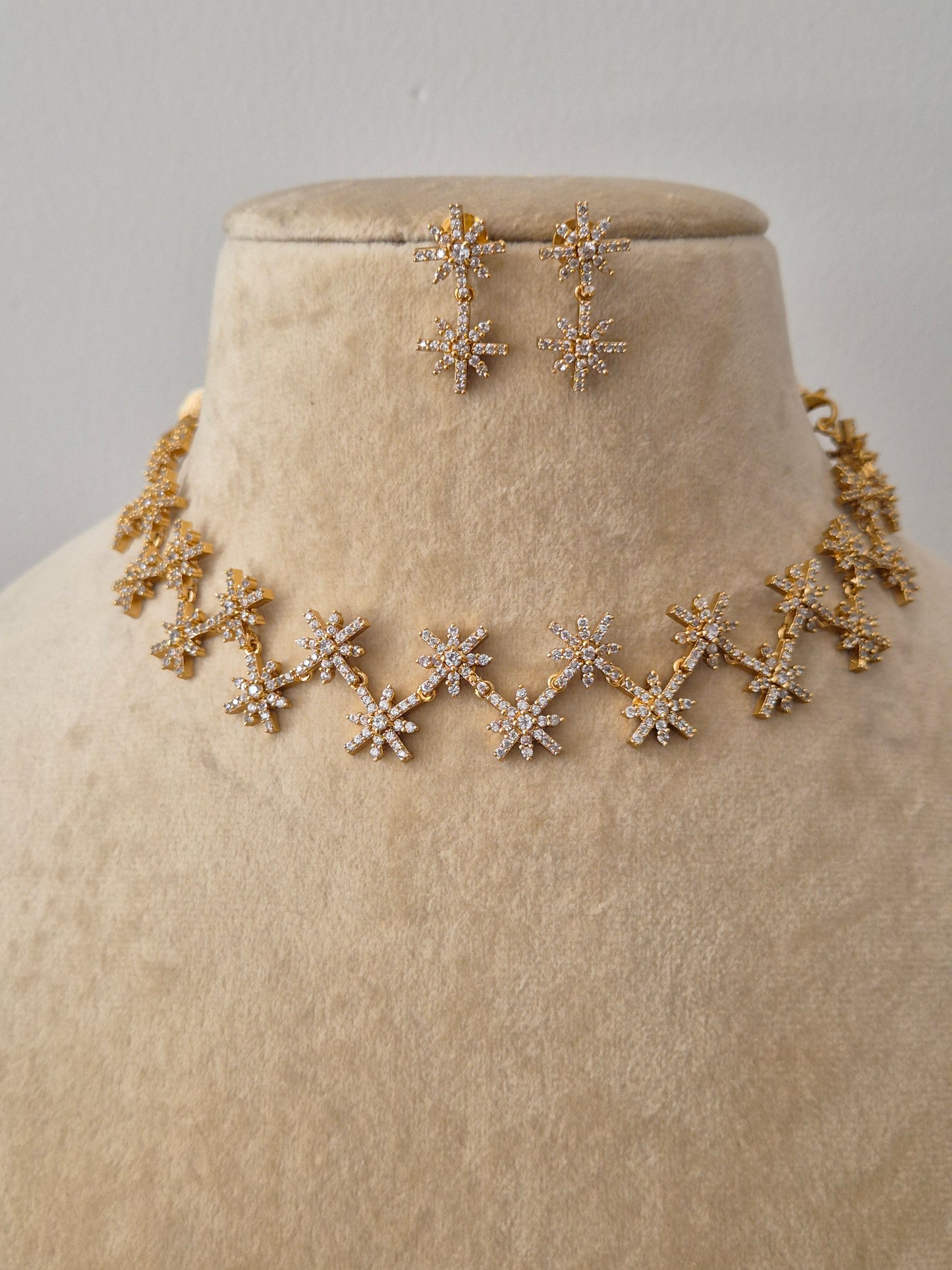 Modern Indian aesthetic Chahat Necklace Set with a dainty starburst design, perfect for elegant festive wear or as a chic bridesmaid accessory by naitri.in