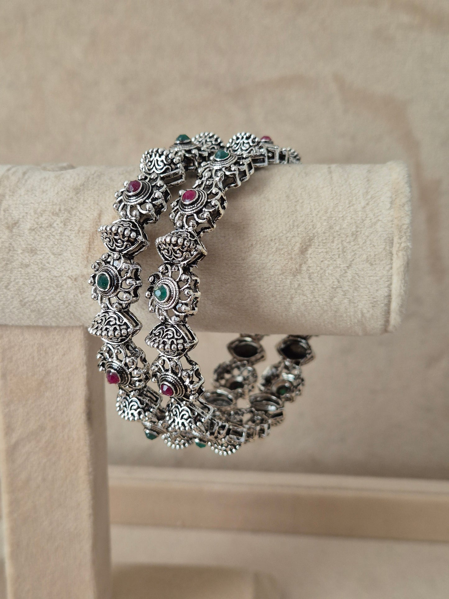 Close-up of Naitri Dhanvi premium silver oxidized bangle bracelet with traditional Indian style patterned metalwork by naitri.in