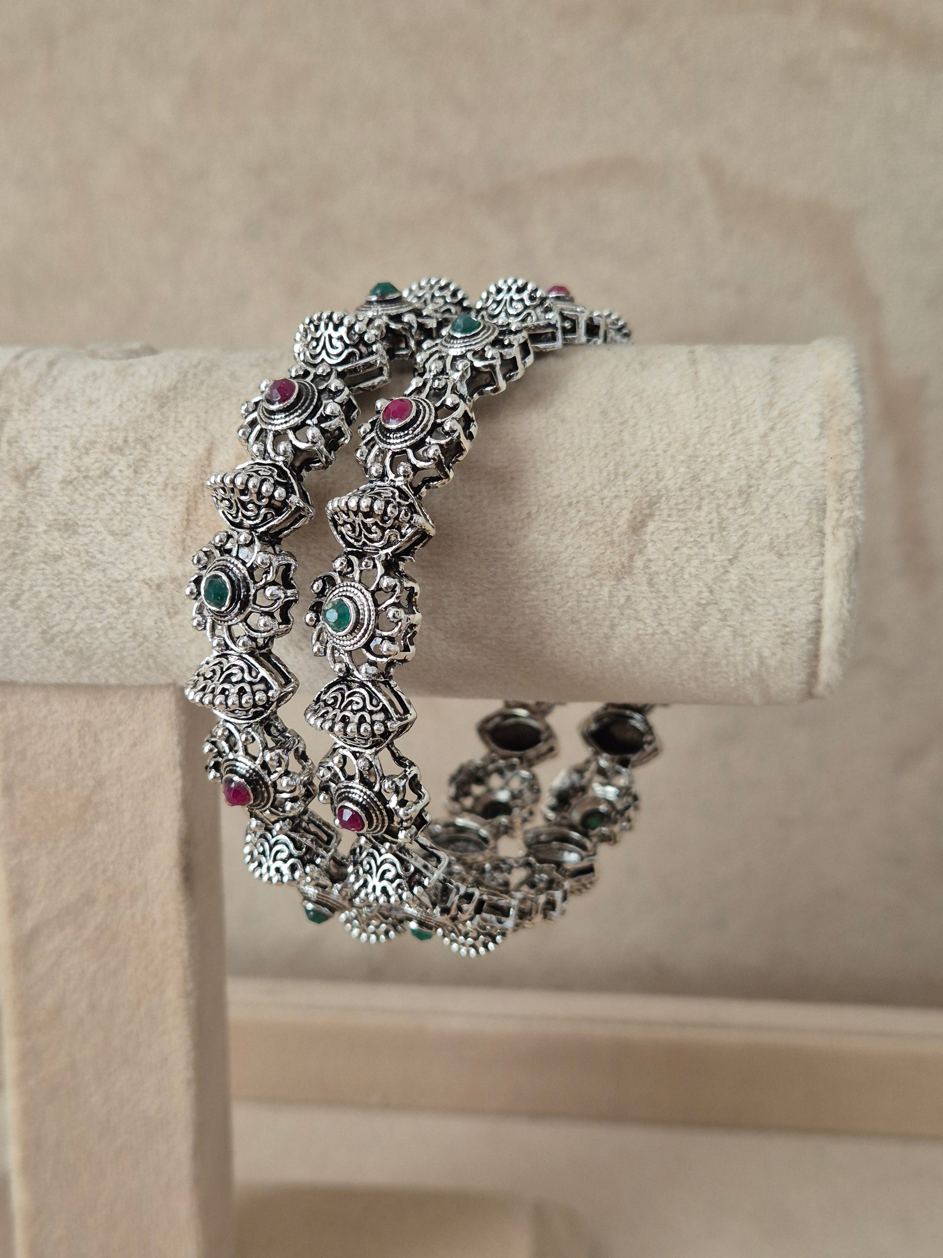 Close-up of Naitri Dhanvi premium silver oxidized bangle bracelet with traditional Indian style patterned metalwork by naitri.in