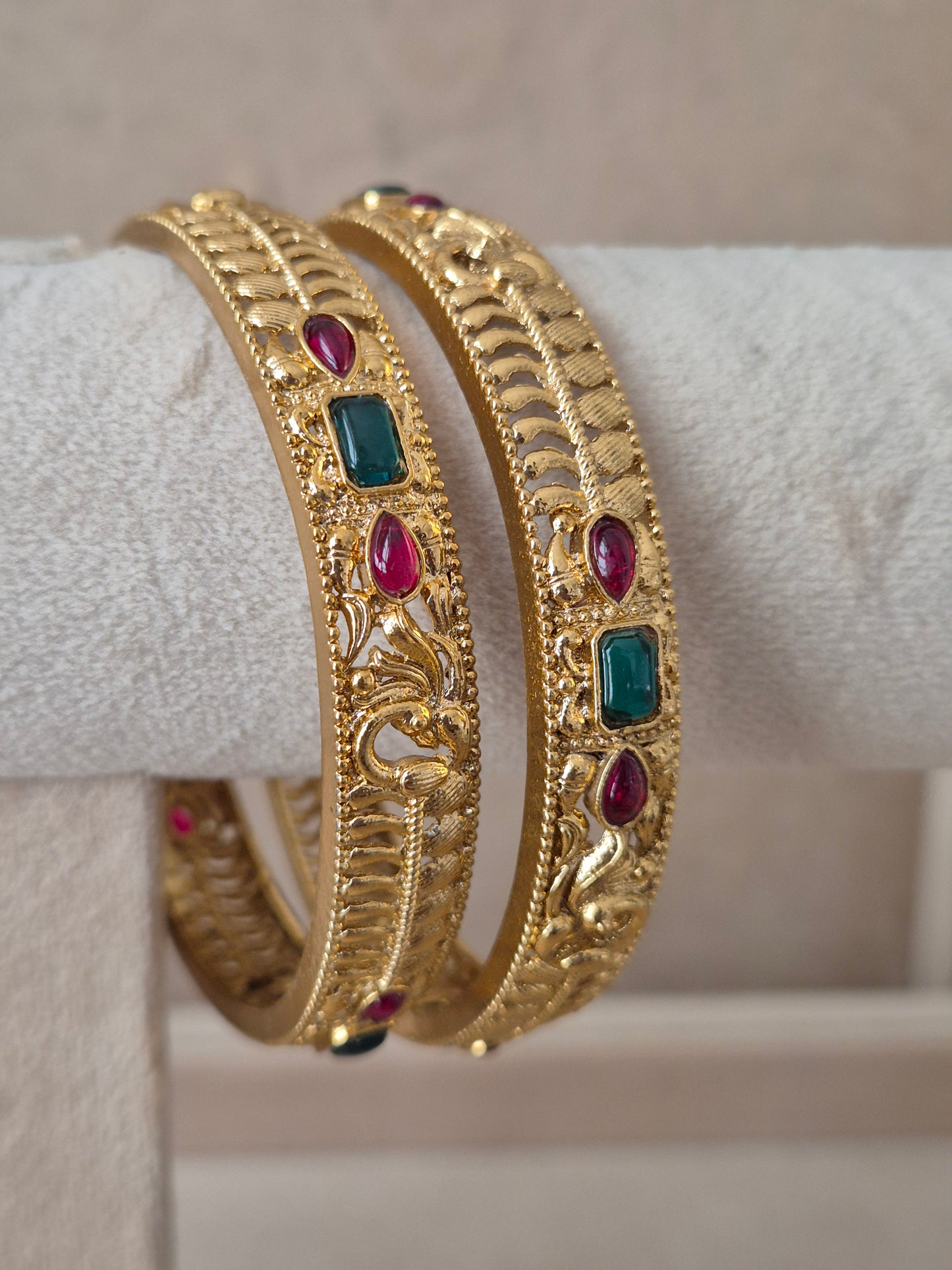 Esha Bangles set of 2, traditional Indian gold-plated bangles with red and green stones, ethnic festive and wedding jewelry collection by Naitri.in