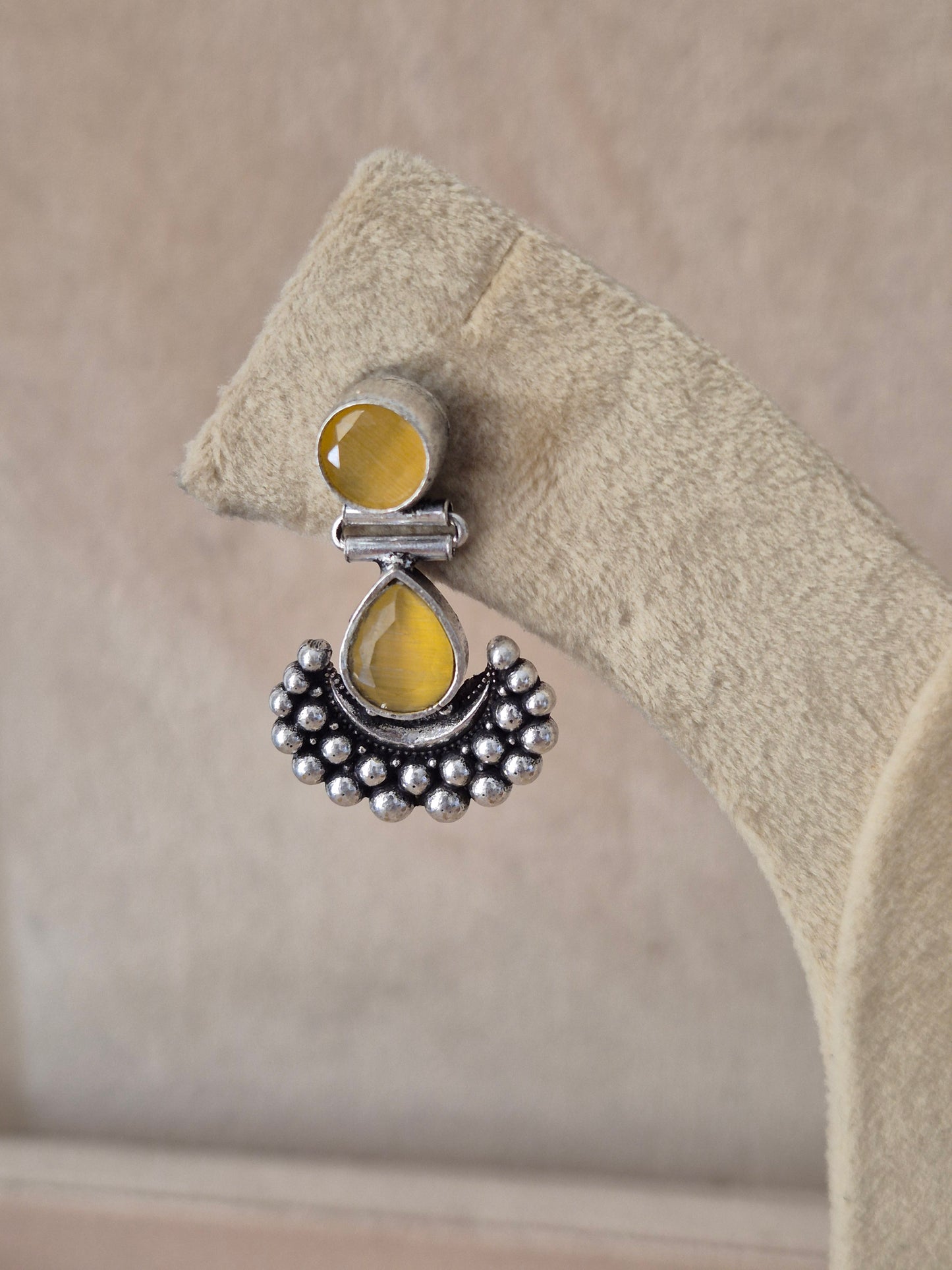 Naitri premium Grishma oxidized silver earrings with yellow gemstones from the Silver Jewellery collection, Handcrafted oxidized alloy dangle earrings with yellow stones by naitri.in