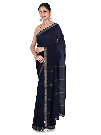 navy blue hand printed cotton-silk saree by Naitri. Traditional printed saree with gold border for women, featuring a matching blouse piece by naitri.in