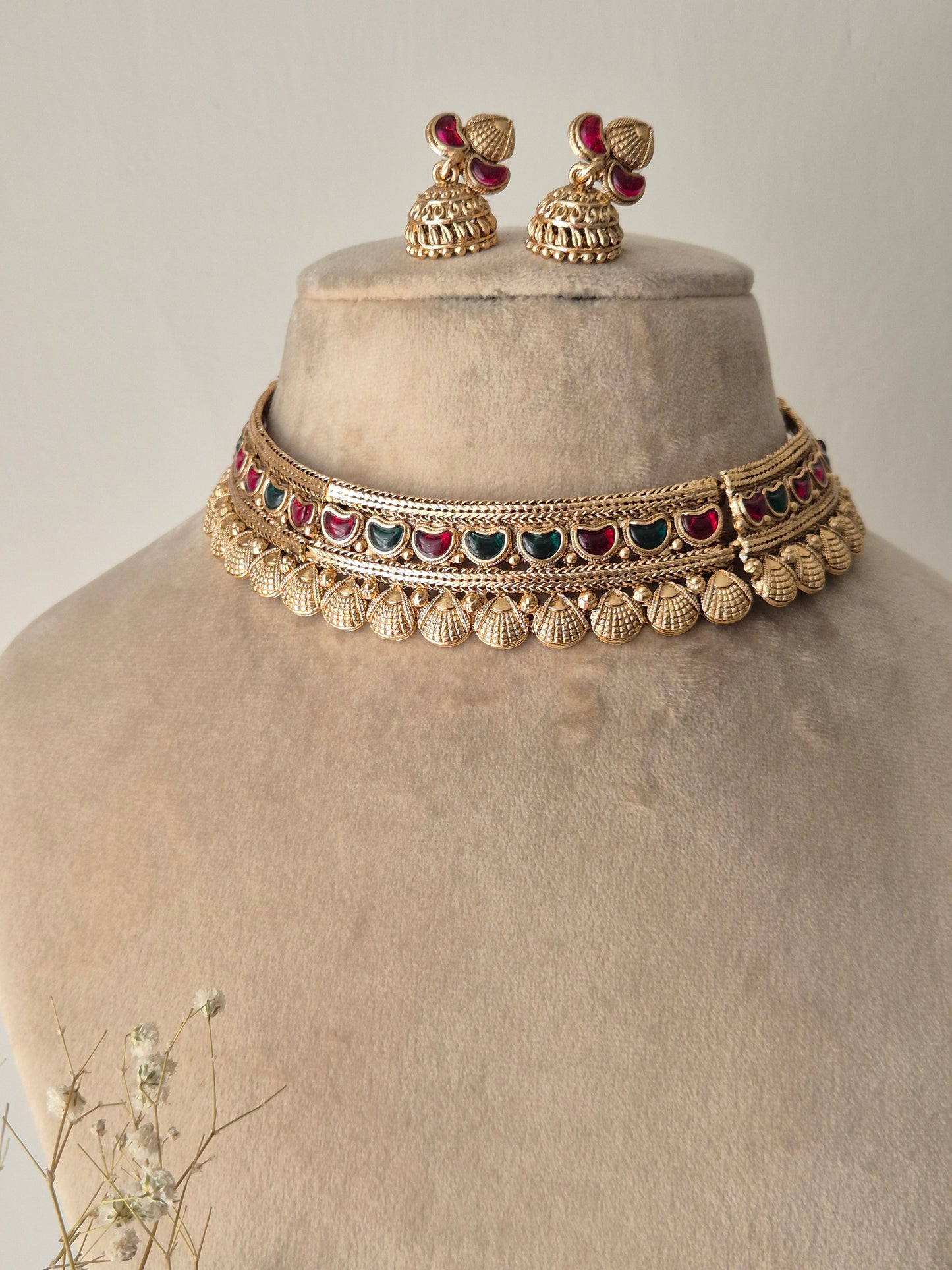 Heavy bridal gold choker set with adjustable dori closure and grand matching jhumki earrings by naitri.in