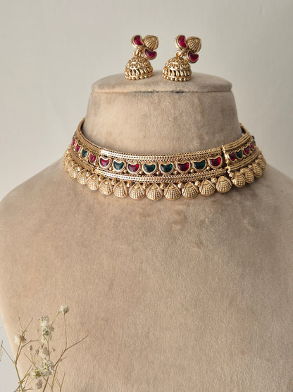 Heavy bridal gold choker set with adjustable dori closure and grand matching jhumki earrings by naitri.in