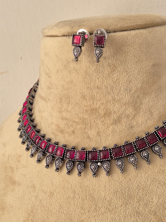 Kokila Necklace Set by Naitri – Oxidized silver and pink stone choker jewelry set with matching studs by naitri.in