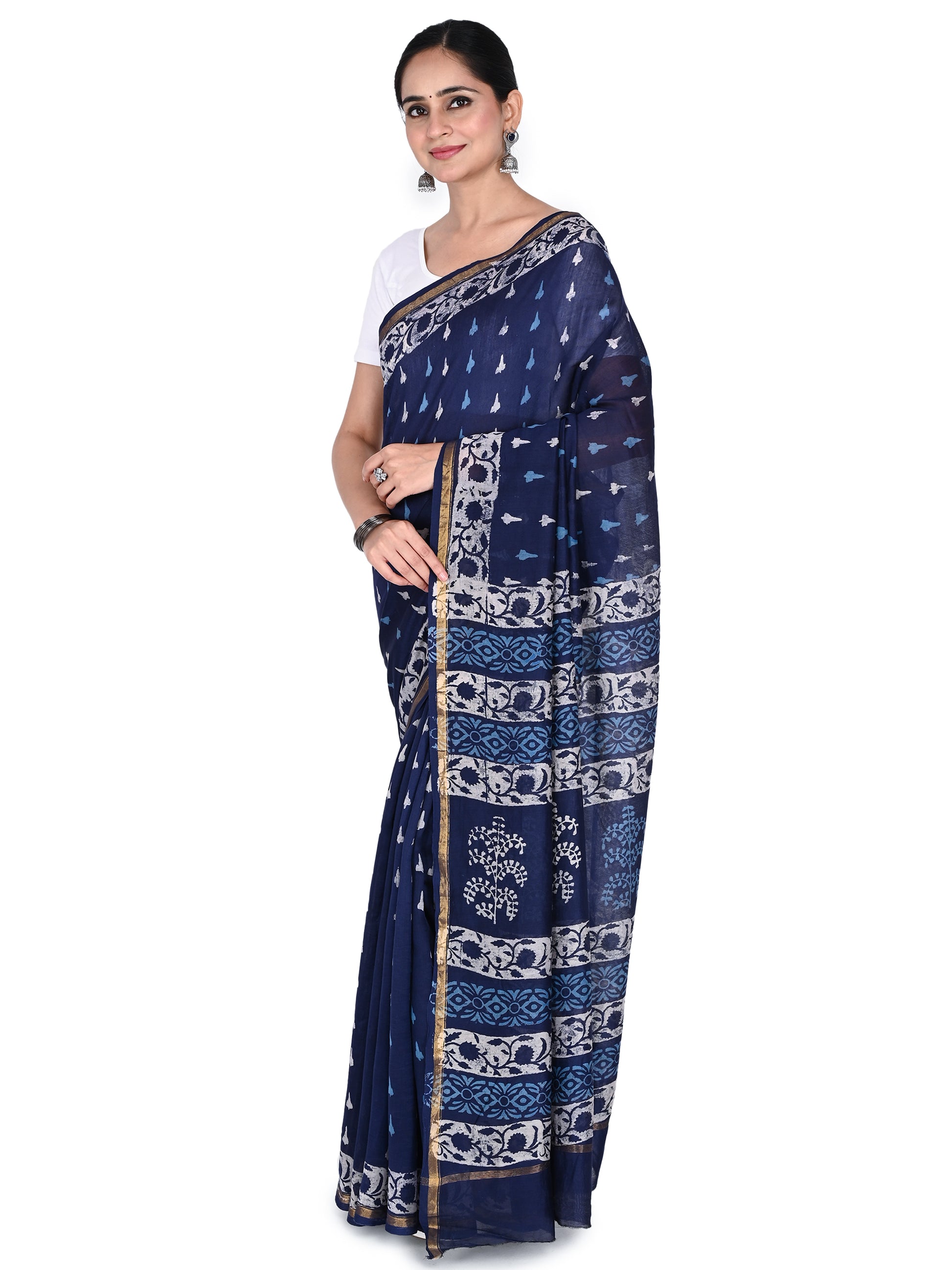 A navy blue hand-block printed saree handcrafted in Bagh, Madhya Pradesh, combining heritage textile art with a contemporary silk-blend finish by naitri.in