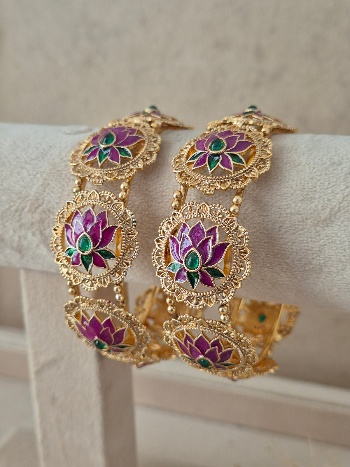 traditional gold-plated ethnic bangles with pink lotus Meenakari design and green stone work by Naitri.in