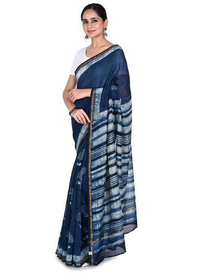navy blue hand block printed cotton-silk saree by Naitri. Traditional Bagh print saree with gold border and floral patterns, handcrafted in Madhya Pradesh