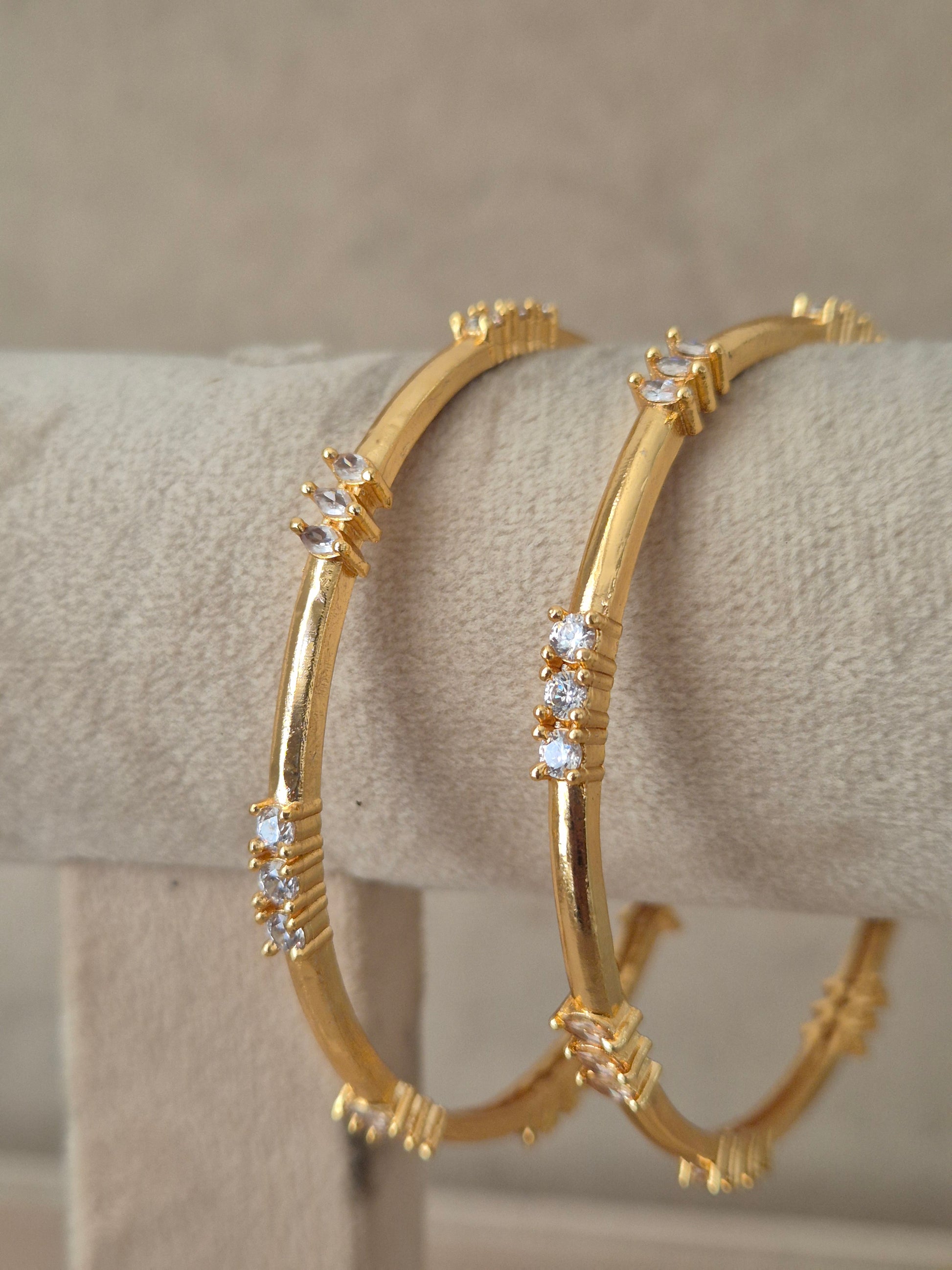 set of 2 antique gold-plated bangles featuring intricate traditional filigree work and floral carved motifs, by naitri.in