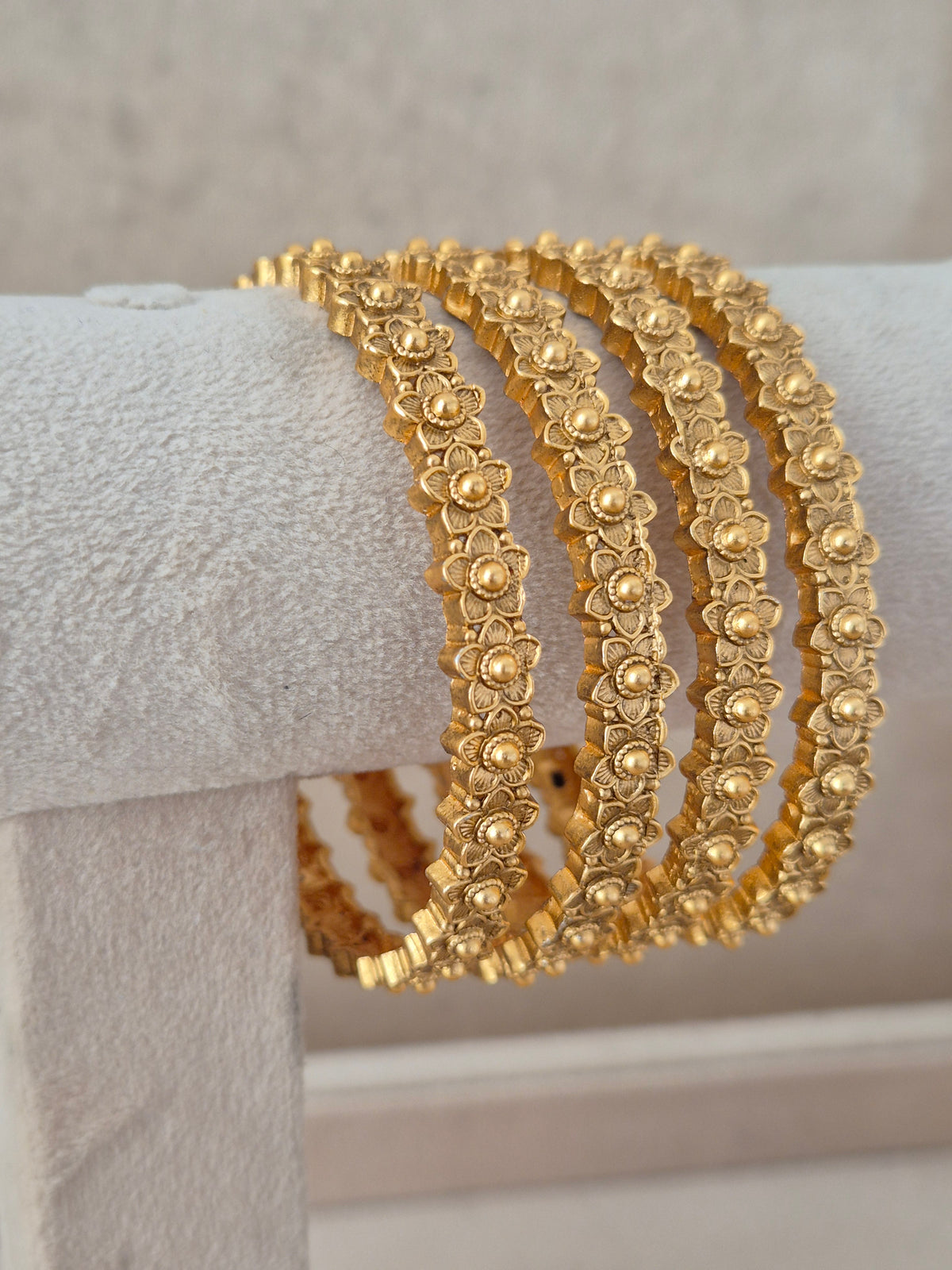Padma Bangles set of 4 – traditional gold-plated ethnic bangles with detailed floral pattern crafting by Naitri.in