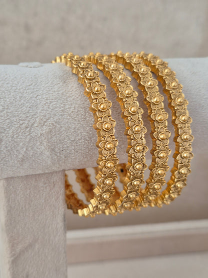 Padma Bangles set of 4 – traditional gold-plated ethnic bangles with detailed floral pattern crafting by Naitri.in