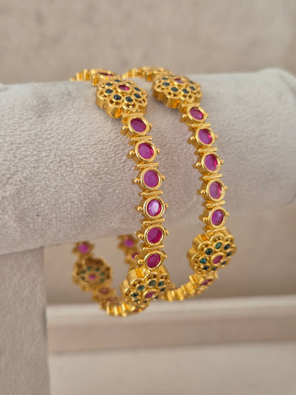 Pavanika Bangles set of 2 – traditional gold-plated ethnic bangles with ruby stone and emerald work by Naitri.in
